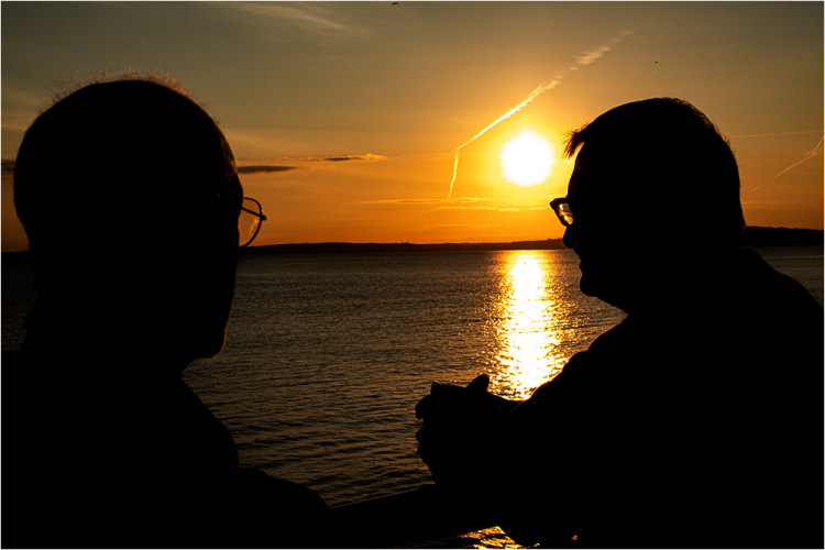 Dewi and Brian in silhouette at Aberafon.
