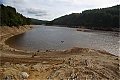 Llyn_Brianne_reservoir_the_house_beginning_to_appear_again_during_July_2018_drought.jpg